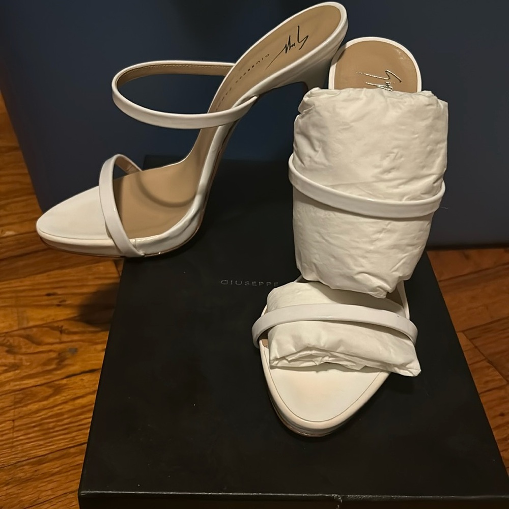 White Giuseppe Heels. Never worn, only tried them on. Comes with original box.
